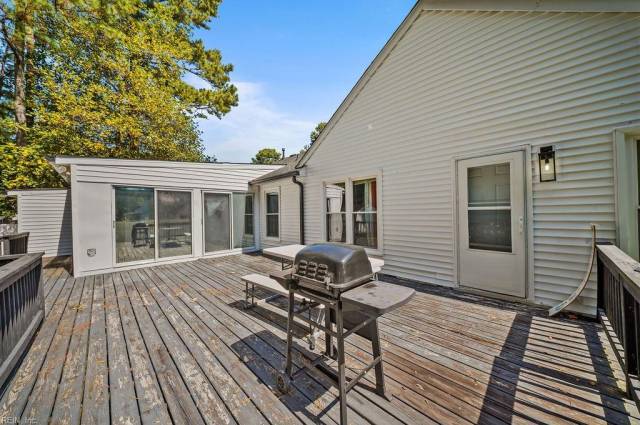 Deck to be repaired and painted by Settlement
Entry way to the Sun Room