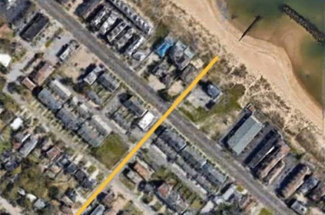Large lot is 3 blocks from the Bay & has approved plans for a 3 story home with 4 bedrooms, 3.5 baths w/ 2 balconies w/ water views!